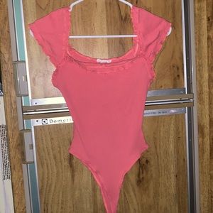 Cute pink body suit